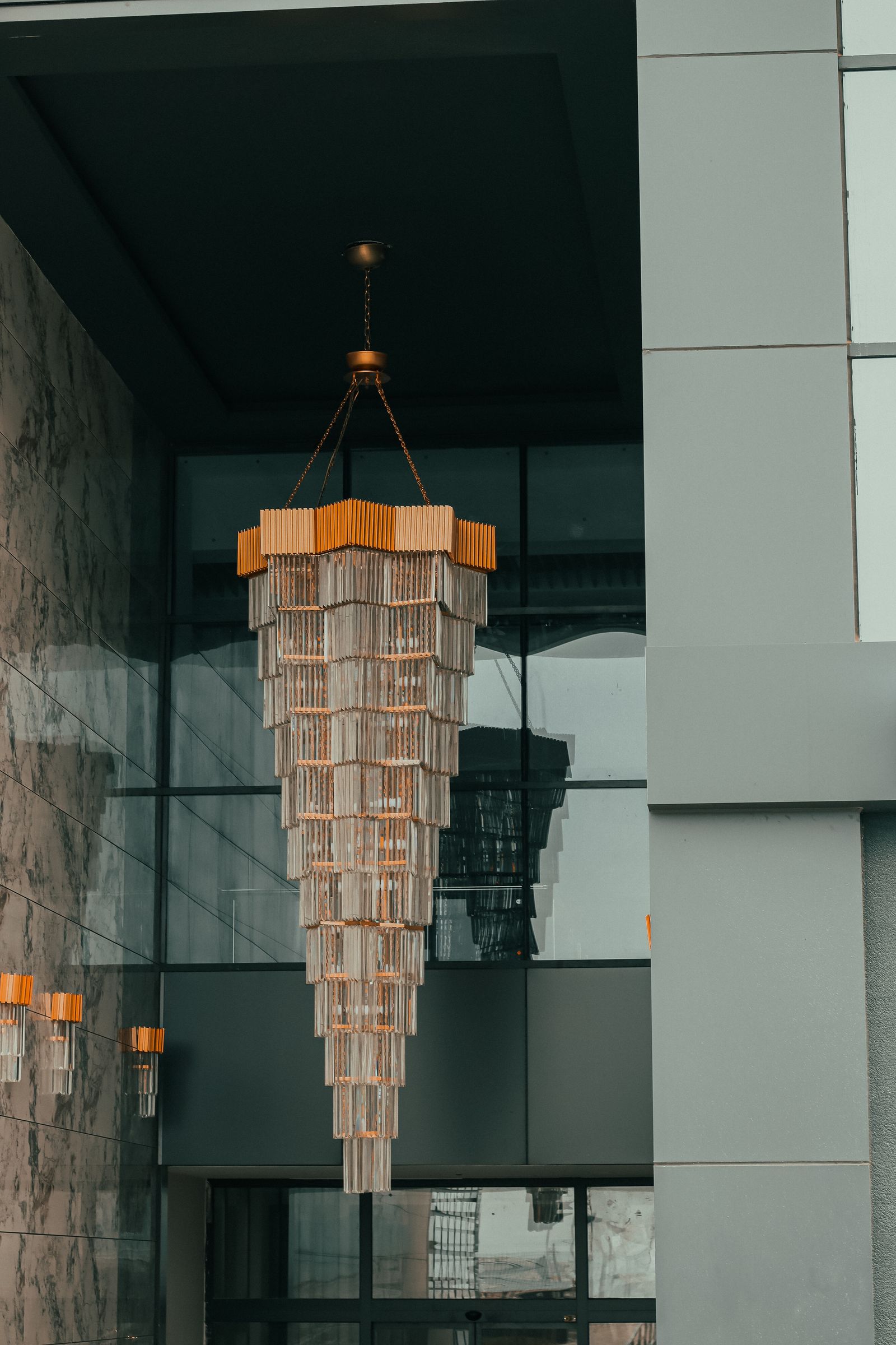 Statement chandelier installed in a modern public interior