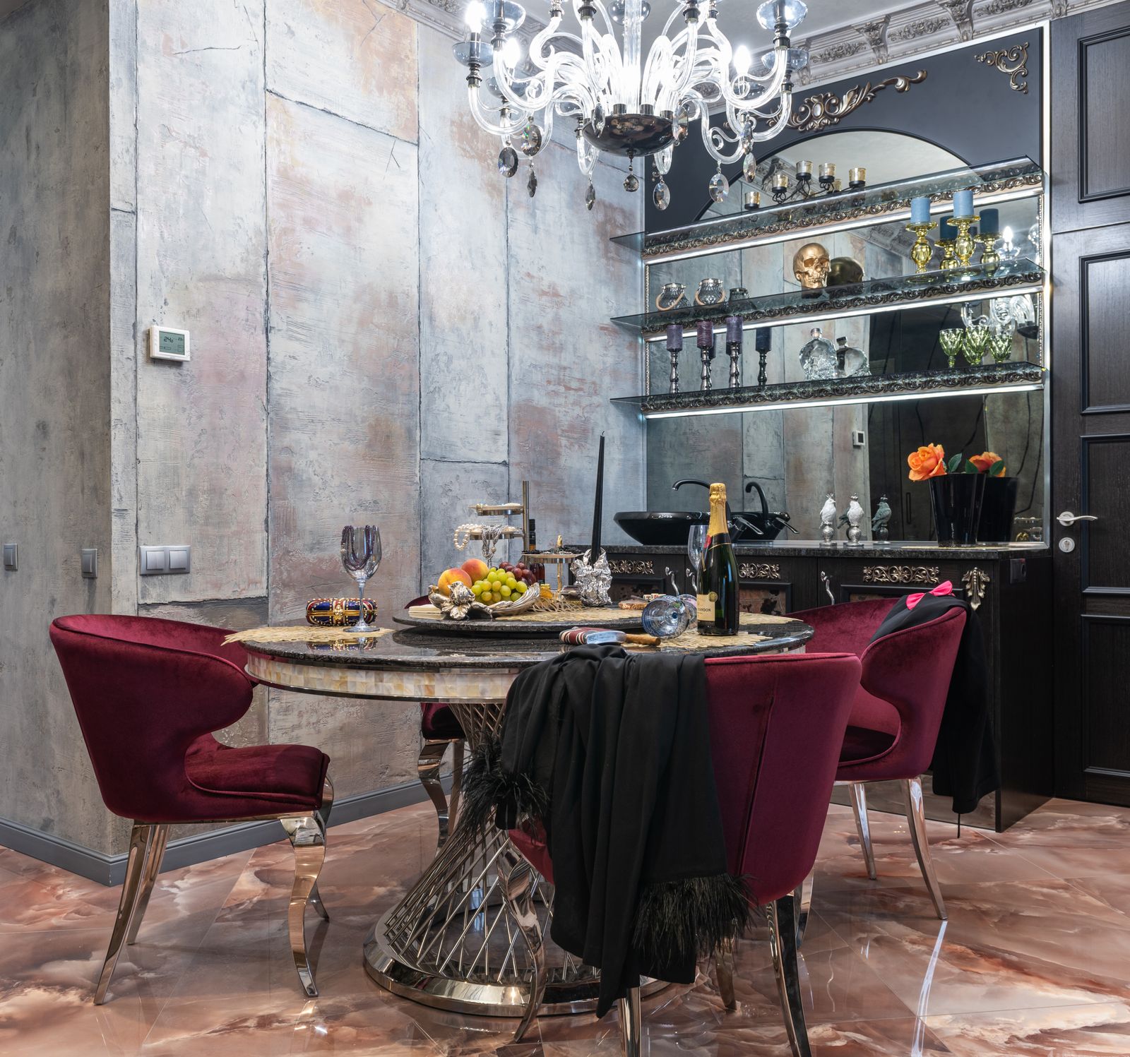 Chandelier above a residential dining setting