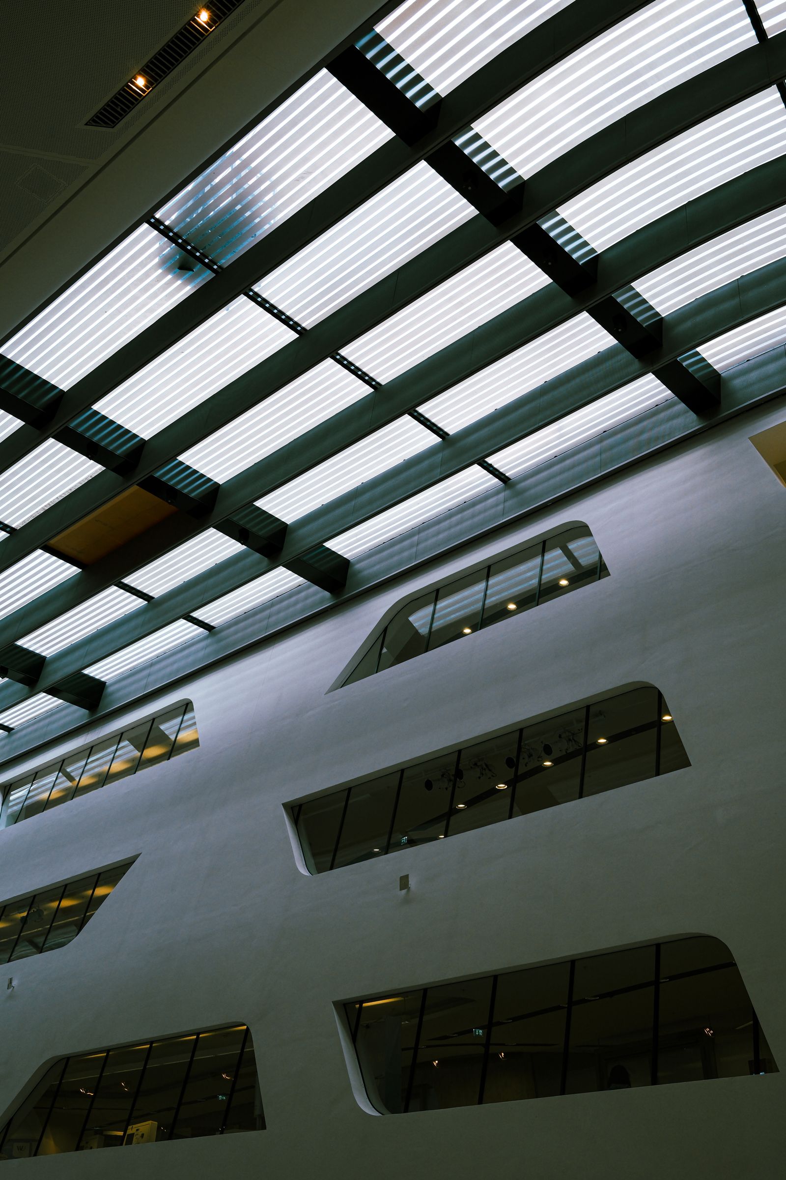 Integrated linear ceiling lights in a contemporary commercial building