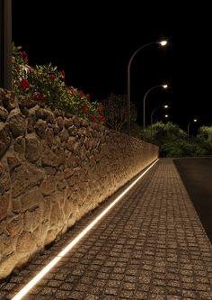 Black and white suspended linear LED fixtures