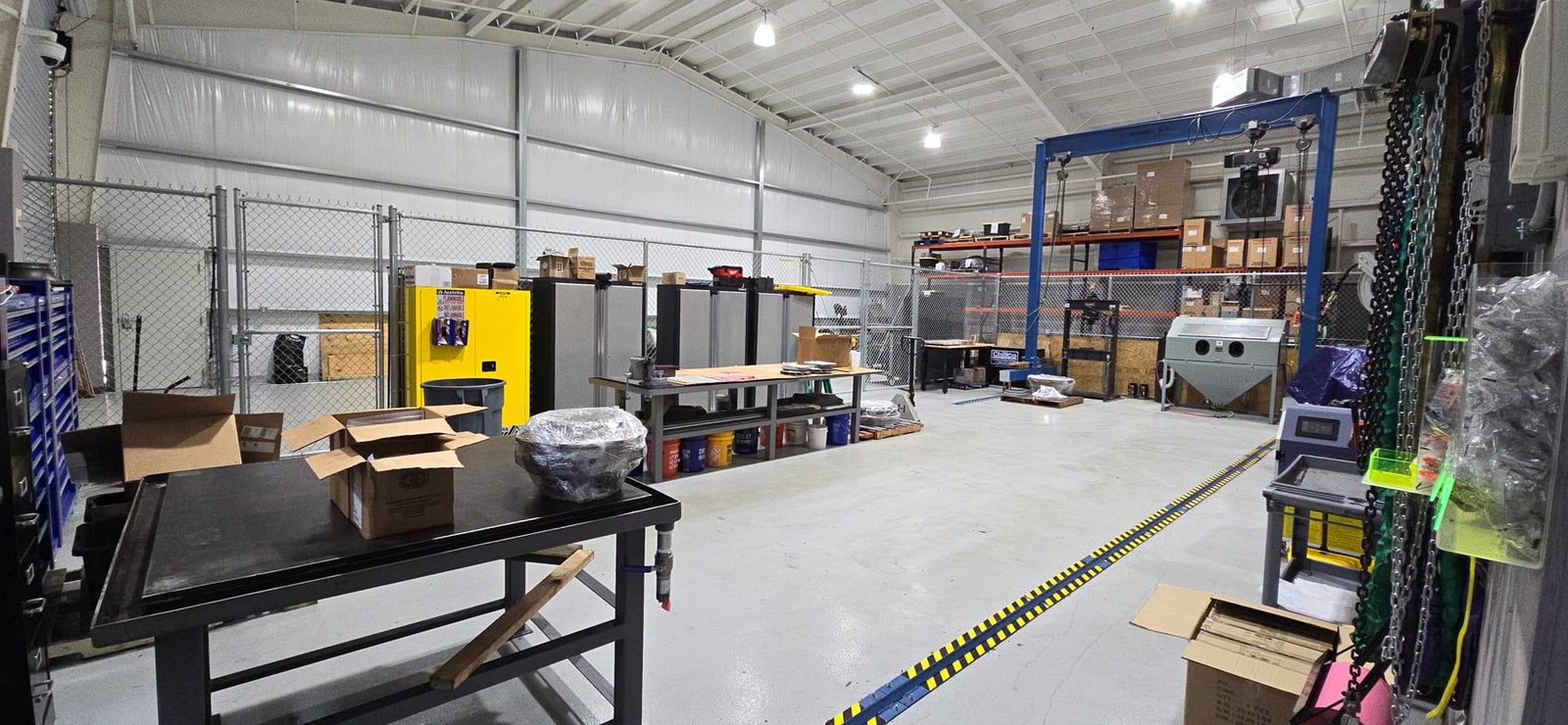 Warehouse interior lit by LED high bay fixtures