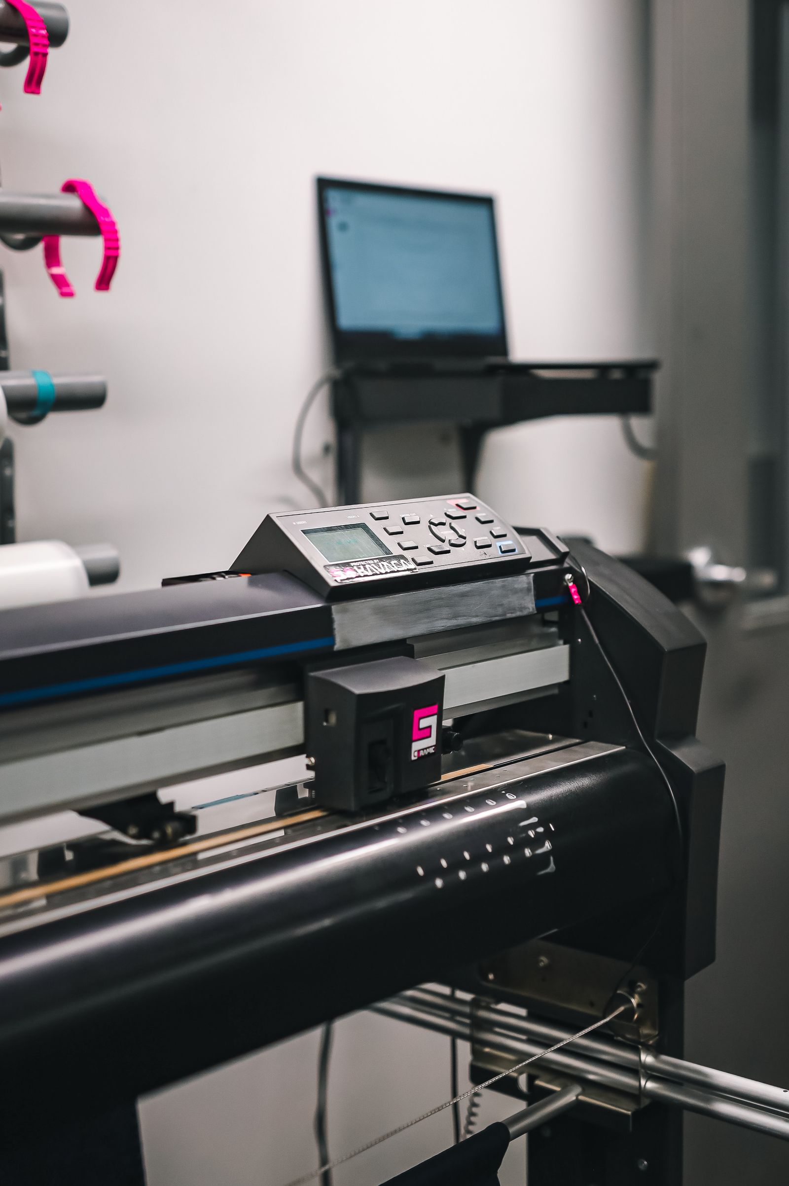 Large-format printer producing a full-color printed graphic